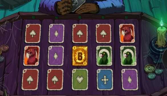 Spelkort pa bord i olika farger med skrackinjagande symboler - Grim the Splitter - Spelautomat recension CasinoGuide.se