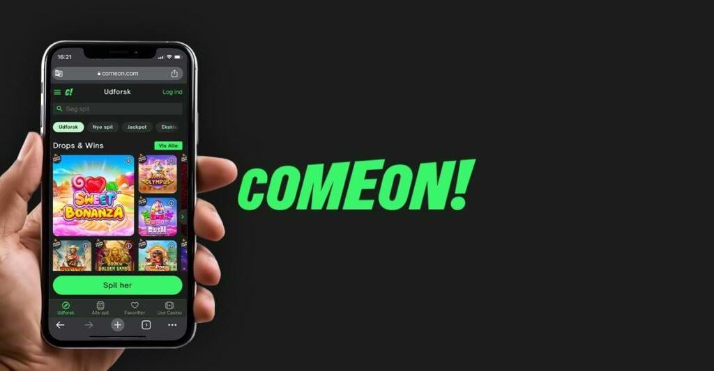 svart bakgrun gron text hand med mobil ComeOn - Casino - mobilcasino